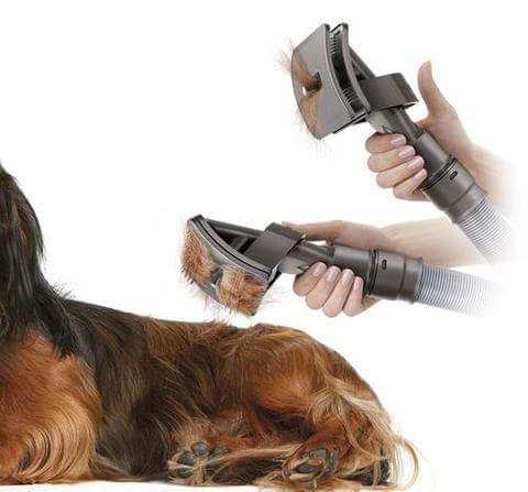 🐾 Pet Grooming Brush Tool vacuuming loose fur from dog, easy shedding cleanup, mess-free grooming solution.